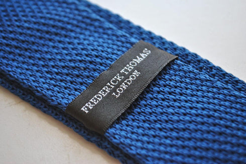 navy blue skinny knitted tie with powder pink polka dots